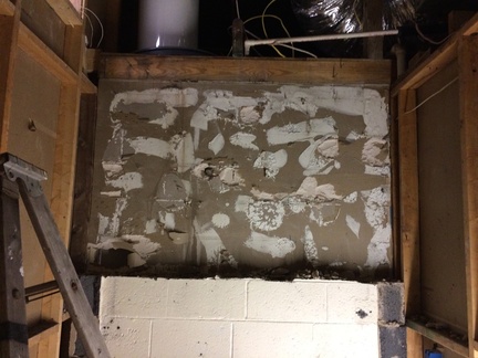 The bathroom sheetrock was glued to the block I removed.
